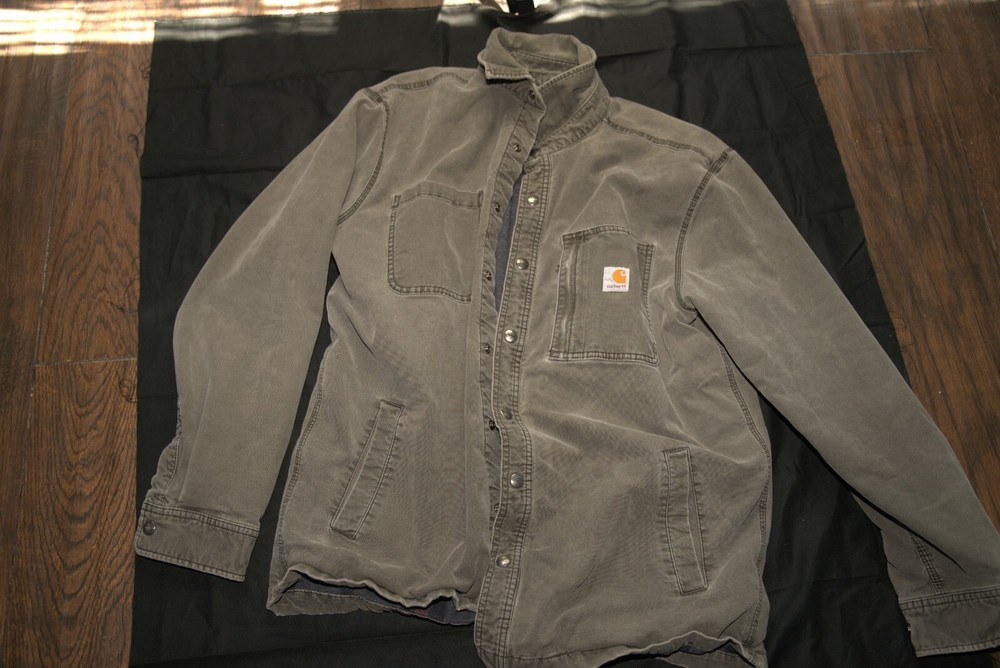 Green Carhartt Work Jacket Durable Outdoor Wear-image